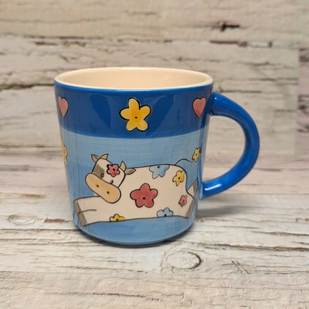 Hand Painted Blue Mug with Cow, Flower And Star Design - Quirky & Whimsical